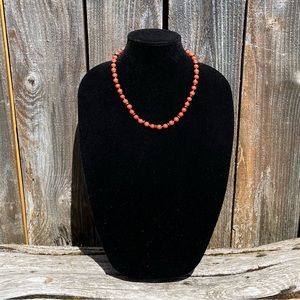 Short warm brown beaded necklace